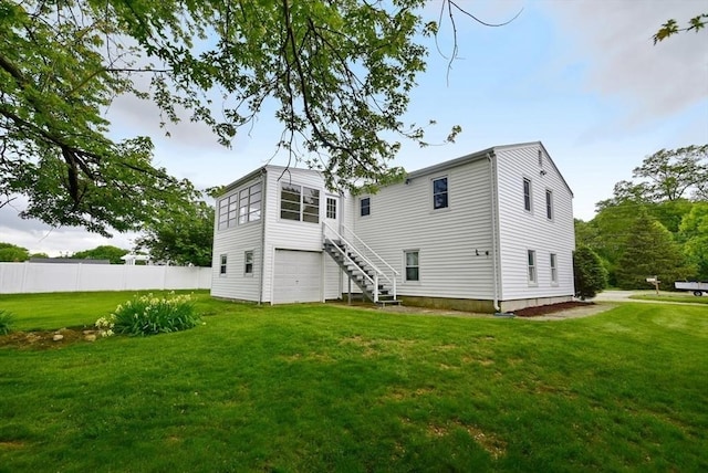 767 S Main St, Bellingham, MA 02019 - rear view of house with an attached garage and stairway