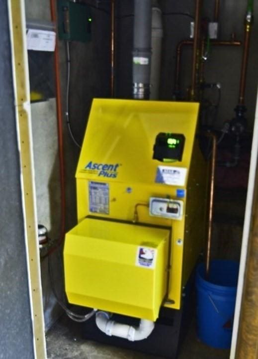 767 S Main St, Bellingham, MA 02019 - utility room with a heating unit
