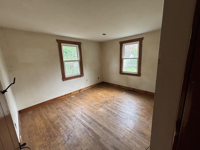 15 Reid Ave, Yarmouth, MA 02673 - unfurnished room featuring plenty of natural light, light wood-style floors, and baseboards