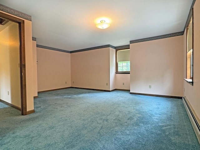 486 Turners Falls Rd, Montague, MA 01351 - unfurnished room featuring baseboard heating, carpet, baseboards, and ornamental molding