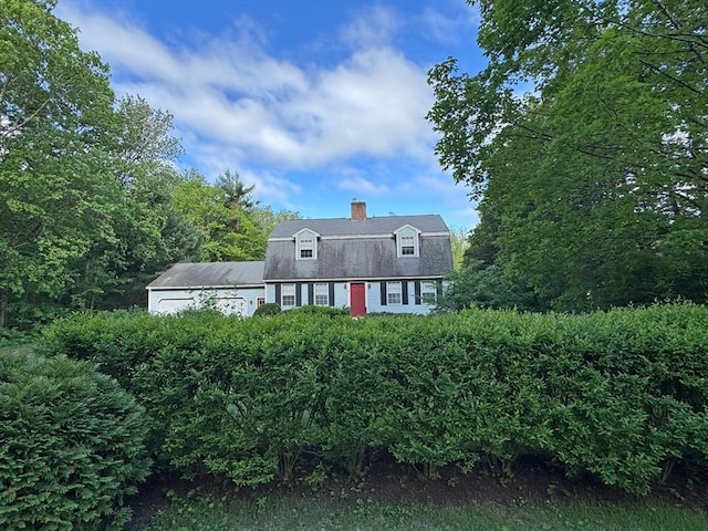 486 Turners Falls Rd, Montague, MA 01351 - dutch colonial featuring a gambrel roof, a chimney, and an attached garage