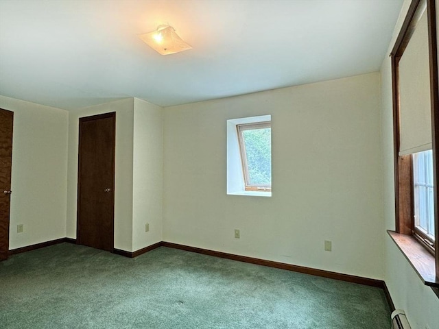 486 Turners Falls Rd, Montague, MA 01351 - carpeted spare room with baseboard heating and baseboards