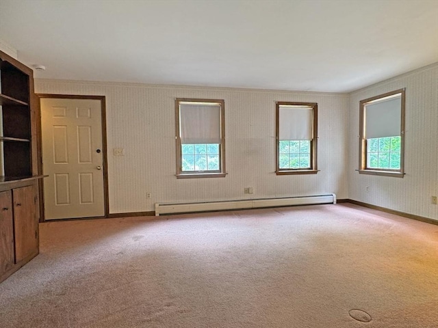 486 Turners Falls Rd, Montague, MA 01351 - spare room with baseboard heating, carpet floors, and baseboards