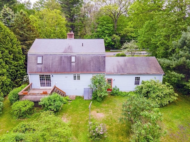 486 Turners Falls Rd, Montague, MA 01351 - rear view of property with a wooden deck, a chimney, a yard, and a shingled roof
