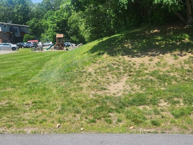 176 Maple Ave Unit 2-1, Rutland, MA 01543 - view of grassy yard with a playground