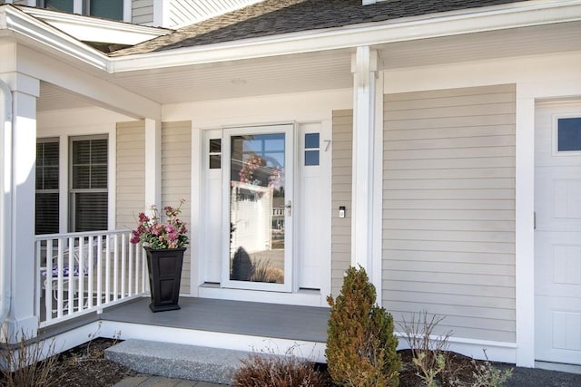 property entrance featuring a porch