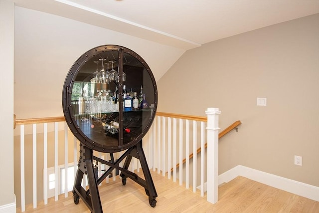 room details with an inviting chandelier, wood finished floors, and baseboards