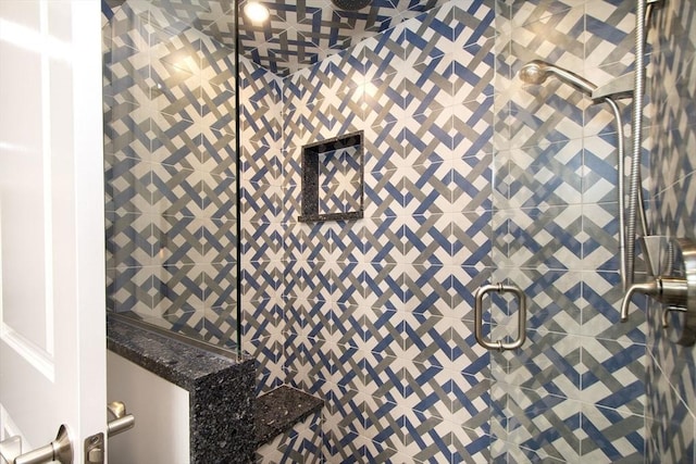 interior details featuring a shower stall