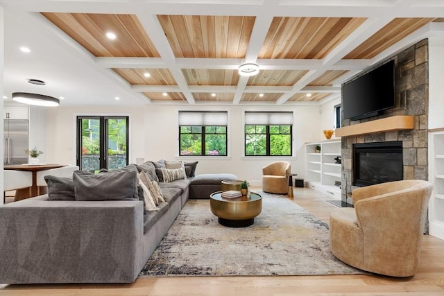 92 Cedar St, Lexington, MA 02421 - living area featuring wood finished floors, coffered ceiling, beamed ceiling, a large fireplace, and recessed lighting