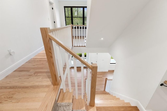 92 Cedar St, Lexington, MA 02421 - staircase with wood finished floors and baseboards