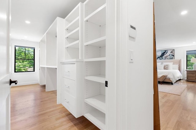 92 Cedar St, Lexington, MA 02421 - walk in closet featuring light wood finished floors