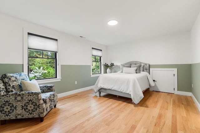 92 Cedar St, Lexington, MA 02421 - bedroom featuring wood finished floors and baseboards