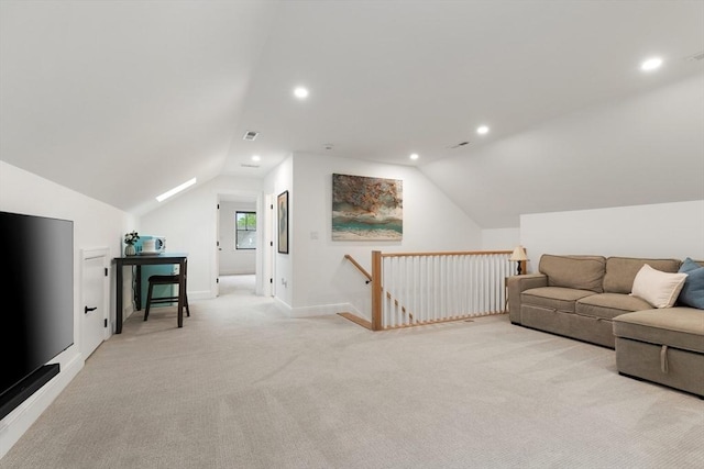 92 Cedar St, Lexington, MA 02421 - living room with lofted ceiling, light colored carpet, recessed lighting, and baseboards