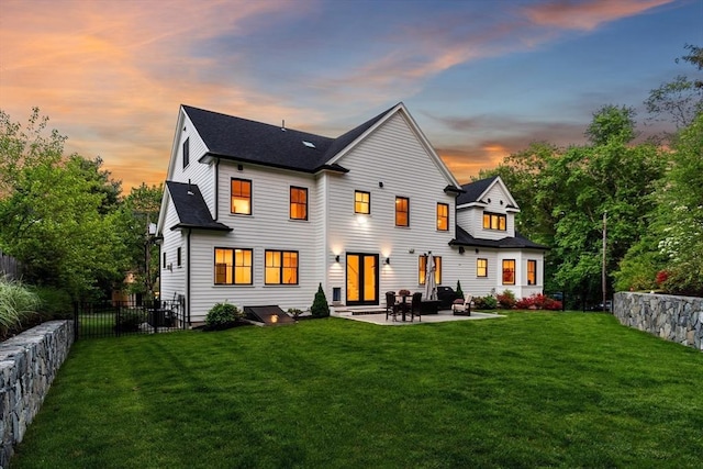 92 Cedar St, Lexington, MA 02421 - rear view of house featuring a patio and roof with shingles