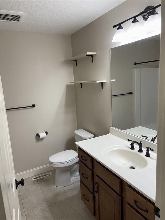 43 Caddyshack Dr, Chicopee, MA 01020 - bathroom with vanity, tile patterned flooring, and a textured ceiling