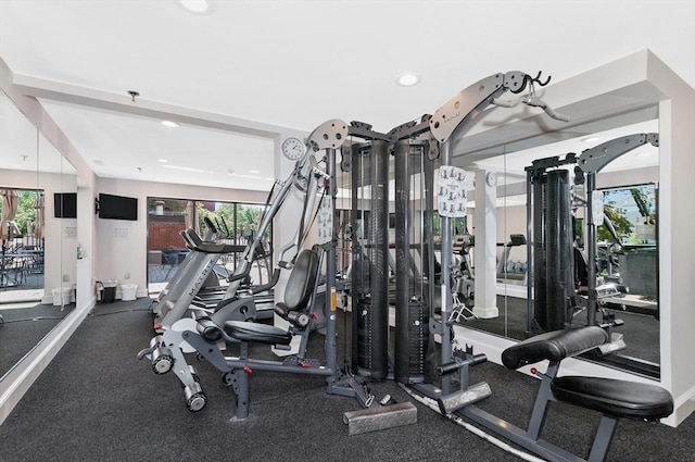 workout area with recessed lighting