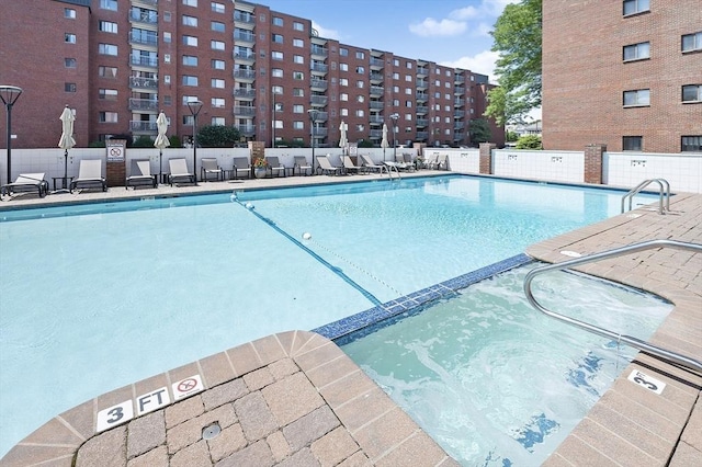 pool featuring fence