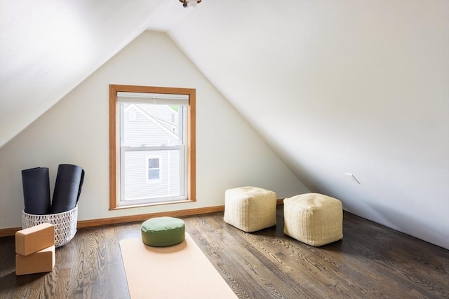 36 Warwick St, Somerville, MA 02145 - sitting room with vaulted ceiling, wood finished floors, and baseboards