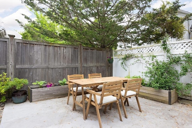 36 Warwick St, Somerville, MA 02145 - fenced backyard with a patio area and outdoor dining area