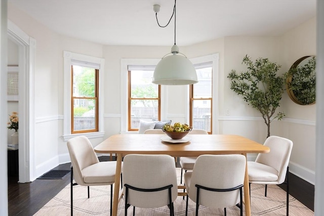 36 Warwick St, Somerville, MA 02145 - dining space featuring wood finished floors and baseboards