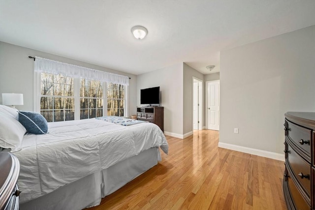 bedroom with light wood-type flooring