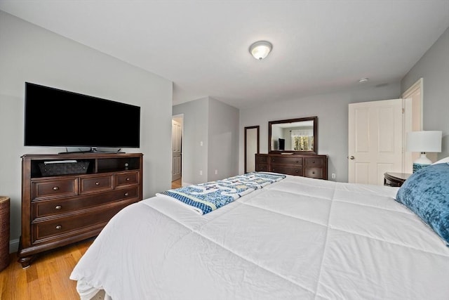 bedroom with light wood-type flooring