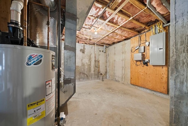 basement featuring gas water heater and electric panel