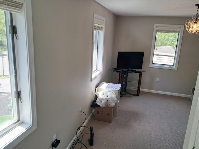 3901 Woodbridge Rd Unit 3901, Peabody, MA 01960 - miscellaneous room featuring carpet floors, a chandelier, and baseboards