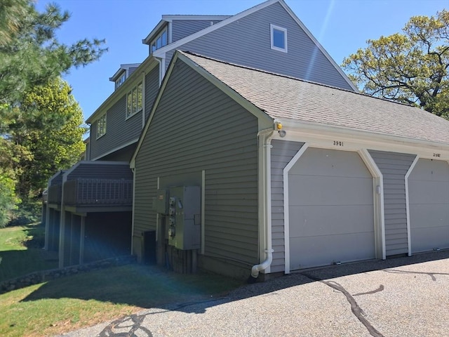 3901 Woodbridge Rd Unit 3901, Peabody, MA 01960 - view of side of home featuring a shingled roof