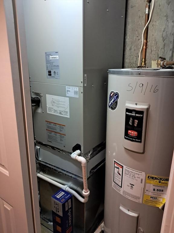 3901 Woodbridge Rd Unit 3901, Peabody, MA 01960 - utility room featuring water heater and heating unit
