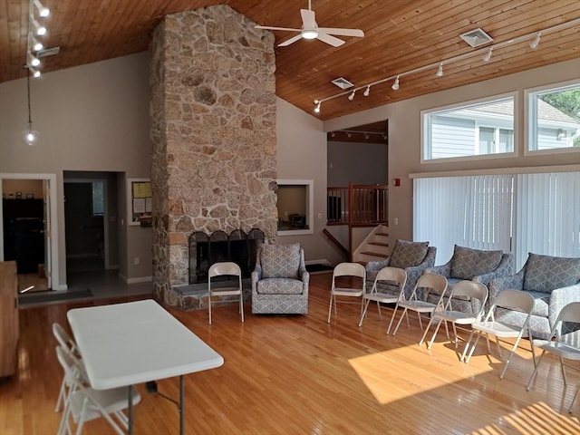 3901 Woodbridge Rd Unit 3901, Peabody, MA 01960 - living area with track lighting, wood ceiling, high vaulted ceiling, a ceiling fan, and wood finished floors