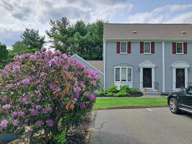 3901 Woodbridge Rd Unit 3901, Peabody, MA 01960 - view of front facade with a front lawn and roof with shingles