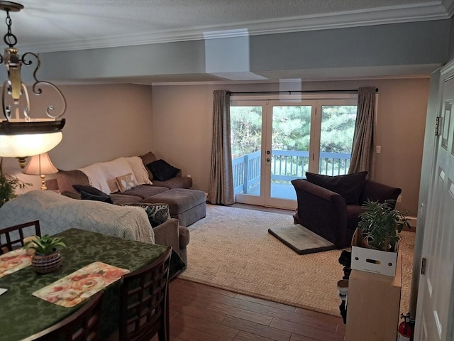 3901 Woodbridge Rd Unit 3901, Peabody, MA 01960 - living area with ornamental molding, wood finished floors, and french doors