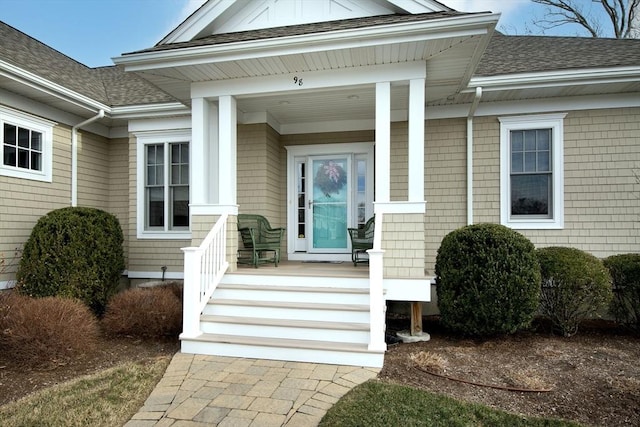 entrance to property featuring a porch