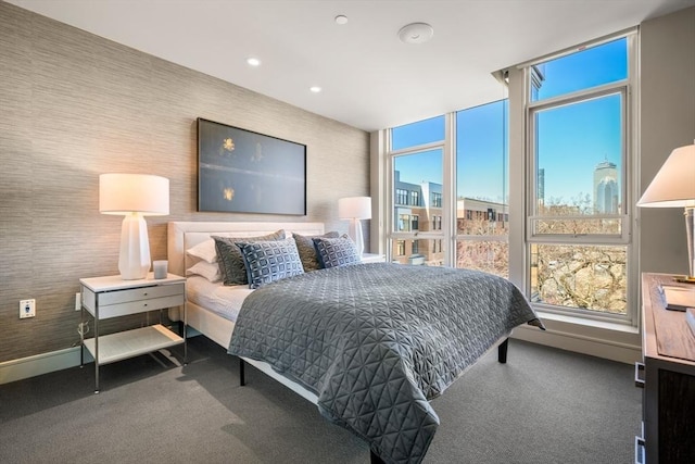 carpeted bedroom with recessed lighting, multiple windows, and wallpapered walls