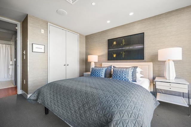 bedroom featuring recessed lighting and a closet