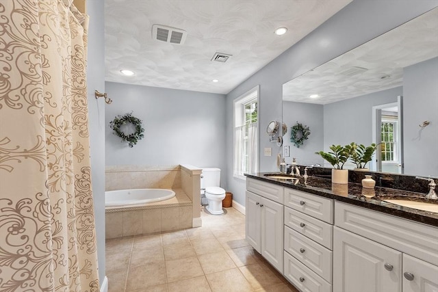 10 Londonderry Ln, Georgetown, MA 01833 - full bathroom with a garden tub, double vanity, tile patterned flooring, and recessed lighting