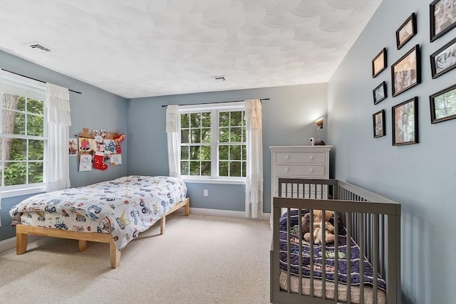 10 Londonderry Ln, Georgetown, MA 01833 - carpeted bedroom featuring multiple windows