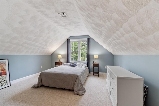 10 Londonderry Ln, Georgetown, MA 01833 - bedroom with light colored carpet, vaulted ceiling, and a textured ceiling
