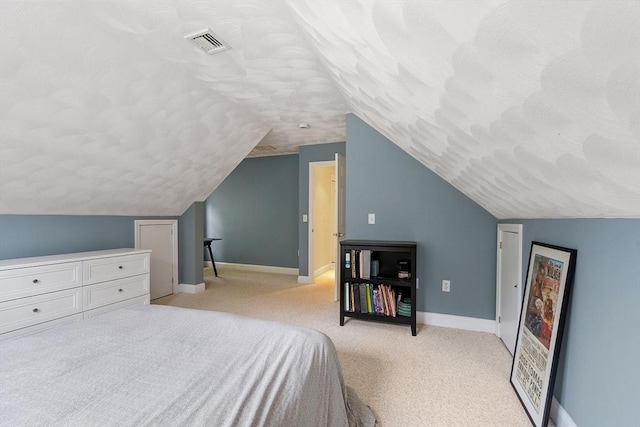 10 Londonderry Ln, Georgetown, MA 01833 - bedroom with light carpet and lofted ceiling