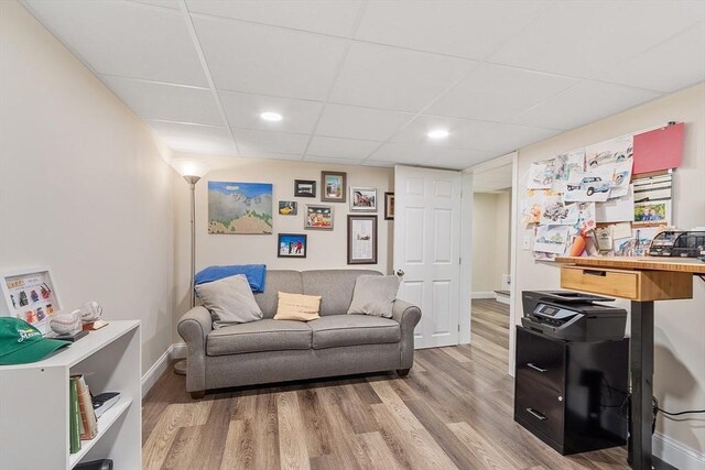 10 Londonderry Ln, Georgetown, MA 01833 - living room with light wood-style flooring, a paneled ceiling, and recessed lighting