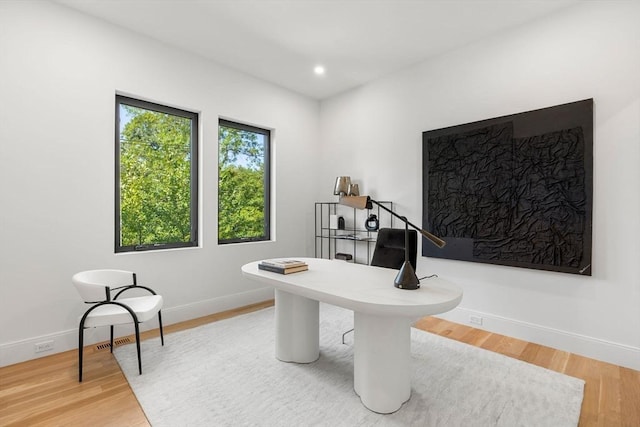 office area featuring baseboards, wood finished floors, and recessed lighting