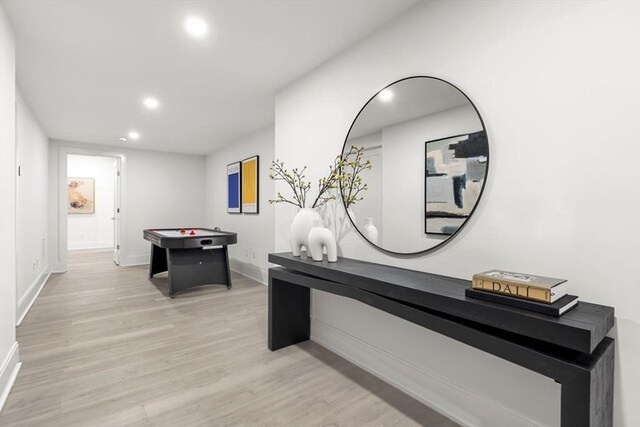 playroom with light wood finished floors, baseboards, and recessed lighting