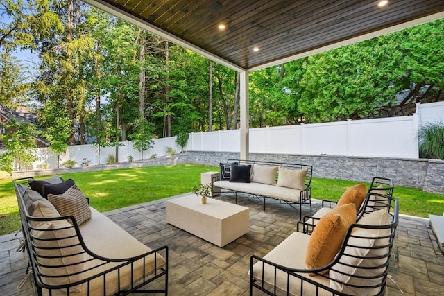 view of patio featuring a fenced backyard and an outdoor hangout area