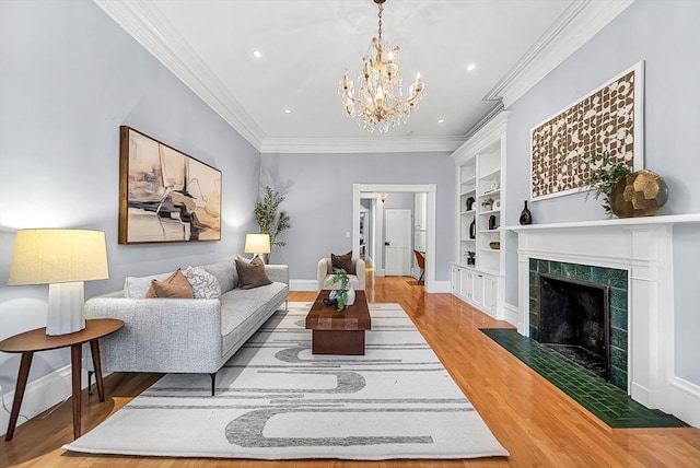318 Commonwealth Ave Unit 3, Boston, MA 02115 - living area with built in features, light wood finished floors, a chandelier, recessed lighting, and ornamental molding