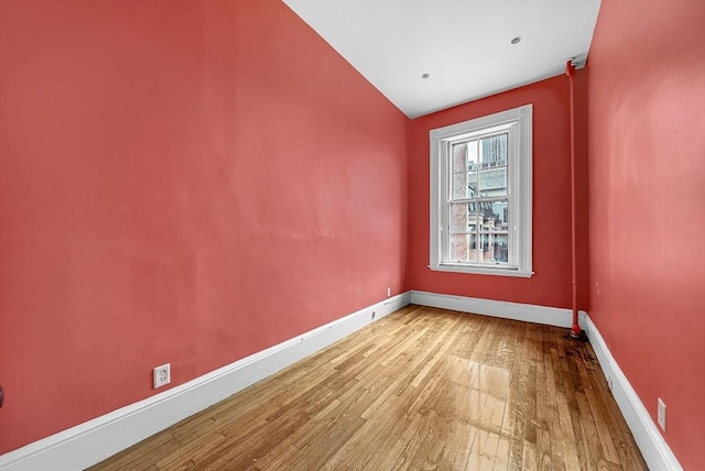 318 Commonwealth Ave Unit 3, Boston, MA 02115 - spare room with light wood finished floors and lofted ceiling