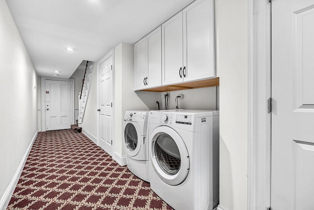 318 Commonwealth Ave Unit 3, Boston, MA 02115 - laundry room featuring cabinet space, dark carpet, washing machine and clothes dryer, and recessed lighting