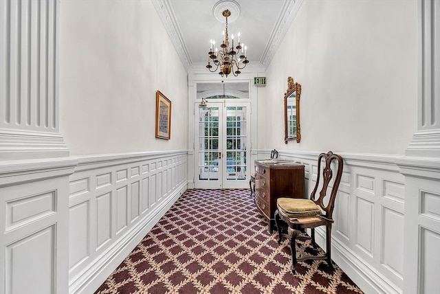 318 Commonwealth Ave Unit 3, Boston, MA 02115 - corridor featuring a decorative wall, ornamental molding, a chandelier, french doors, and dark carpet