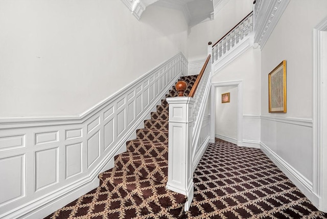 318 Commonwealth Ave Unit 3, Boston, MA 02115 - staircase with carpet flooring, a high ceiling, and ornamental molding