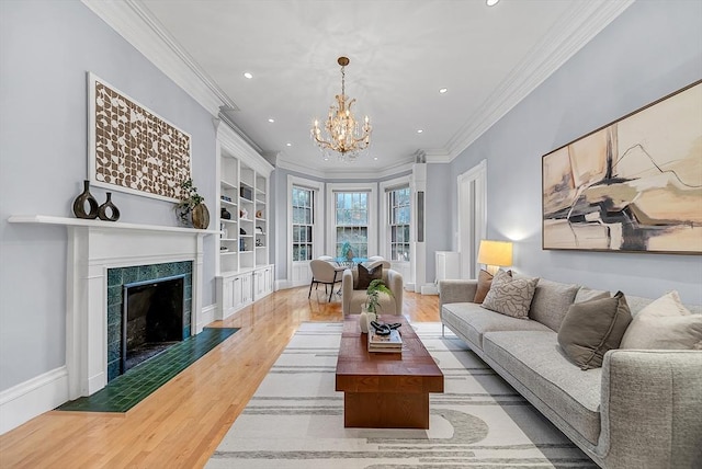 318 Commonwealth Ave Unit 3, Boston, MA 02115 - living area featuring recessed lighting, wood finished floors, a chandelier, crown molding, and a fireplace